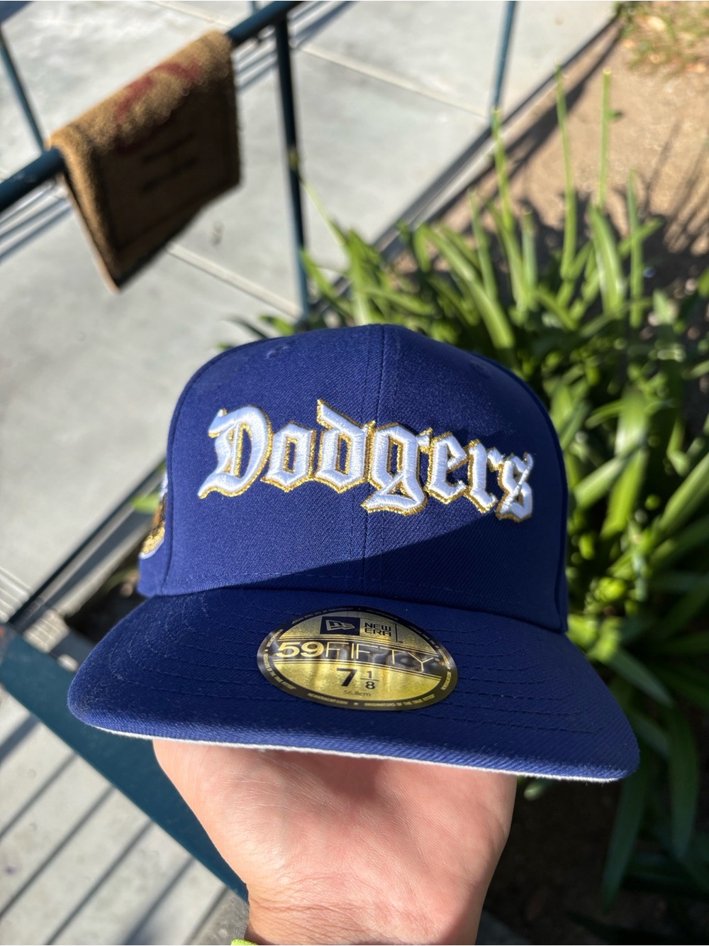 New Era Dodgers Navy Blue Fitted Hat with White and Gold Script